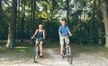 Active seniors riding bike in summer nature Royalty Free Stock Photo