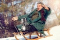 Active smiling senior man sleigh Royalty Free Stock Photo