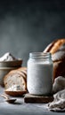 Active sourdough starter in glass jar with bubbles Royalty Free Stock Photo