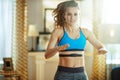 Active sports woman workout and using heart rate monitor