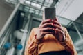 Woman using mobile app on her smartphone Royalty Free Stock Photo