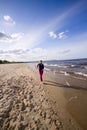 Active woman on the beach Royalty Free Stock Photo