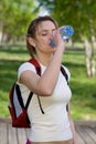 Active woman drinking water Royalty Free Stock Photo