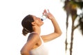 Active woman drinking water after exercise workout Royalty Free Stock Photo