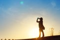 Active woman drinking water at sunsettime Royalty Free Stock Photo