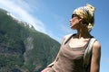 Active woman in headscarf on the mountain route