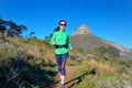 Active woman runner runs trail