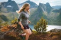 Active woman running in mountains of Norway outdoor travel adventure hiking healthy lifestyle trip Royalty Free Stock Photo