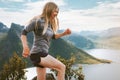 Active woman trail running in Norway mountains outdoor travel healthy lifestyle adventure athletic training Royalty Free Stock Photo