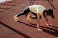 Active young brunette doing morning workout outdoor Royalty Free Stock Photo