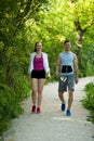 Active young couple on a wlak in the park