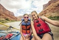 Active young family enjoying a fun whitewater rafting trip Royalty Free Stock Photo