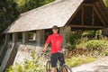 Active young man cycling in forest on a hot summer day Royalty Free Stock Photo