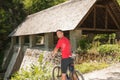 Active young man cycling in forest on a hot summer day Royalty Free Stock Photo