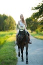 Active young woman ride a horse in nature Royalty Free Stock Photo