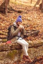 Woman eating a sandwich while taking a hiking break Royalty Free Stock Photo