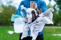 Activist collect plastic, paper, glass trash in park