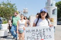 An activist holds a sign