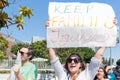 An activist holds a sign