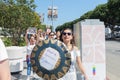 An activist holds a sign that says,