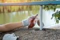 volunteer worker painting with brush or roller and renovate railing or fence Royalty Free Stock Photo