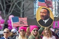 Activists with American flags and image of Martin Luter King