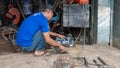 Activities of ironworkers and welders in the street Singa Perbangsa, Dipatiukur, Bandung. Royalty Free Stock Photo