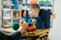 Activities for kids with disabilities. Preschool Activities for Children with Special Needs. Boy with with Cerebral