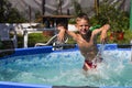 Activities on the pool, children swimming and playing in water, happiness and summertime