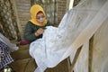 The activities of women batik artisans from Malon Gunung Pati Semarang Indonesia village produce natural patterned batik.
