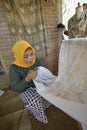 The activities of women batik artisans from Malon Gunung Pati Semarang Indonesia village produce natural patterned batik.