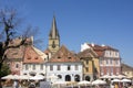 Activity in the small square, Sibiu, Romania Royalty Free Stock Photo