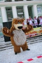 Actor animator of the house of culture of the city metallostroy in the costume of the jolly bear entertains children and adults