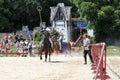 An actor as medieval knight demonstrate skills on horseback at the annual Bristol Renaissance Faire Royalty Free Stock Photo