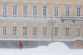 Actor in costume of Peter The Great walking on the street during a snowfall in St. Petersburg