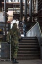 Actor at the filmset in an abandoned industrial building