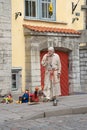 The actor-puppeteer in medieval dress shows a representation of the streets of the old town. Tallinn, Estonia Royalty Free Stock Photo