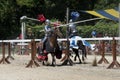 Actors as medieval knights jousting at the annual Bristol Renaissance Faire Royalty Free Stock Photo