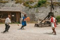 Actors doing a theatrical staging as medieval fighters in the castle of Baux-de-Provence.