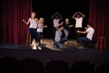 Actors practicing play on stage Royalty Free Stock Photo