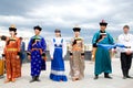 Actors in Russian and Buryat national costumes