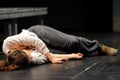 An actress, in the floor after being poisoned, of the Barcelona Theater Institute