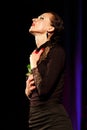 Actress plays a role in the theater. Emotional performance of a woman