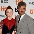 Actress Thomasin McKenzie and producer Taika Waititi at premiere of Jojo Rabbit at TIFF Royalty Free Stock Photo