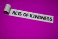 Acts of Kindness text, Inspiration and positive vibes concept on purple torn paper