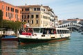 Actv water bus with famous Rialto bridge, Venice, Italy