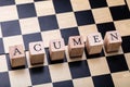 Acumen Word On Wooden Block Over Chessboard Royalty Free Stock Photo