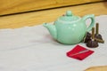 Acupuncture needle and moxa roll and tea pot concept helthy and relax still life style