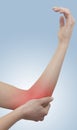 Acute pain in a woman elbow