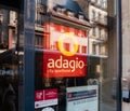 Adagio hotel in france with city reflection in entrance door